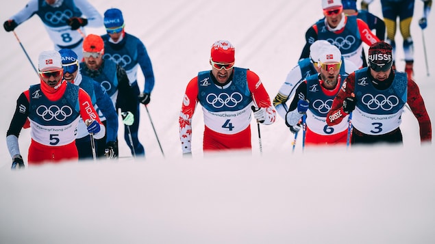 Alex Harvey (4) pendant l'épreuve du skiathlon des Jeux olympiques de Pyeongchang