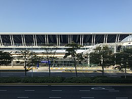 Terminal 1 of Shanghai Pudong International Airport from Pudong International Airport Station (Shanghai Maglev).jpg