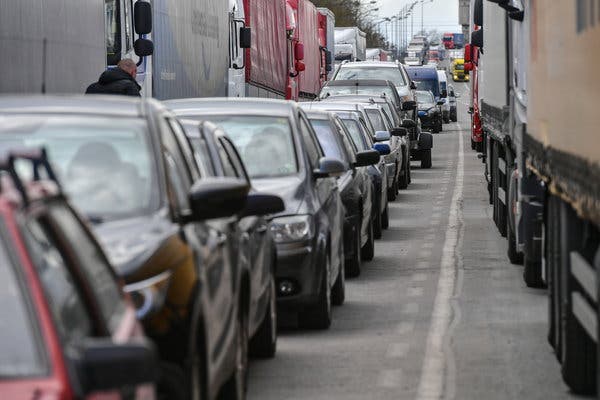 Long lines formed at the Polish-Ukranian border Saturday hours before a ban on foreigners entering Poland took effect.