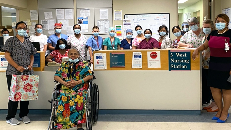 Surujdai Sawh is seen with health-care workers at Centenary Hospital on July 17, 2020. (Scarborough Health Network) 