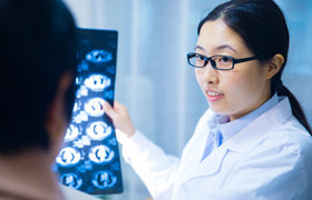 Doctor discussing MRI with patient