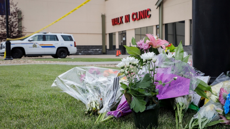 An impromptu memorial for Dr. Walter Reynolds, who died after he was attacked in an examination room rests outside the Village Mall walk-in clinic in Red Deer, Alta., Tuesday, Aug. 11, 2020.THE CANADIAN PRESS/Jeff McIntosh