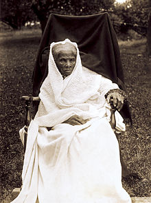 Photo of Tubman seated and dressed in white