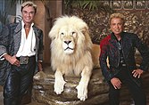 Siegfried & Roy with a white lion
