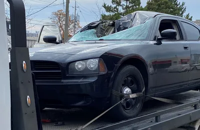 Dodge Charger flying wheel tire rim collision Toronto Michael Bendixen
