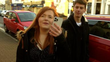 Reporter Lucy Edwards (L) and her friend Dave (R)