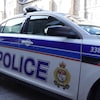 Une voiture du Service de police d'Ottawa stationnée dans le marché By.