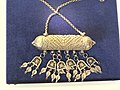 Silver amulet with pendants.jpg