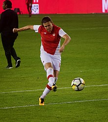 Sinclair warms up before an international friendly in November 2017
