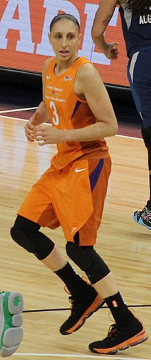 Olympic gold medal basketball player Diana Taurasi in her orange Phoenix Mercury team jersey