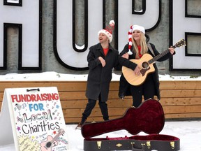 It's hard not to smile when you see Stephen Hughes and his Community Living Stratford and Area support worker Stephanie Sellers busking in downtown Stratford or performing at one of their sing-along concerts. Over the past year alone, the pair raised more than $1,200 for the United Way Perth-Huron, which they presented to the organization late last month. (Galen Simmons/The Beacon Herald)