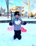 Avaya Chaput stands in front of Seaforth Manor with hearts to hang on their trees. Community members have come together to raise money for Seaforth Manor. Handout