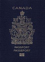 Cover of a Canadian Regular Passport. Cover is navy blue colour with a gold-coloured crest. Text reads “CANADA” above the crest, and “PASSPORT” and “PASSEPORT” below the crest.