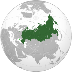 Russia on the globe, with unrecognised territory shown in light green[a]