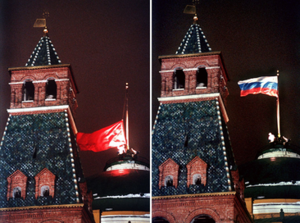 The Soviet flag being lowered from the Moscow Kremlin and replaced with the flag of Russia