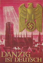 A propaganda poster of a large cathedral with sunlight shining on it. Several buildings can be seen around the cathedral while a left-facing eagle clutching a swastika is seen in the upper right corner of the poster. The words "DANZIG IST DEUTSCH" can be seen in the bottom left of the poster.