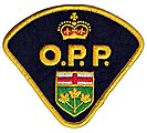 The badge of Ontario Provincial Police featuring the Crown
