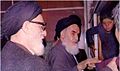 Khomeini before a speech at Alavi school.