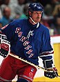 Image 6 Wayne Gretzky Photo credit: Håkan Dahlström Ice hockey player Wayne Gretzky, as a member of the New York Rangers of the National Hockey League (NHL) in 1997. Gretzky, nicknamed "The Great One", is widely considered the best hockey player of all time. Upon his retirement in 1999, he held forty regular-season records, fifteen playoff records, and six All-Star records. He is the only NHL player to total over 200 points in one season—a feat he accomplished four times. In addition, he tallied over 100 points in 15 NHL seasons, 13 of them consecutively. He is the only player to have his number (99) officially retired by the NHL for all teams. More selected portraits