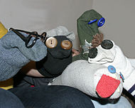 Toy puppets made from socks with buttons for eyes