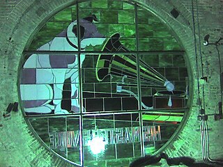 One of 4 Nipper stained glass windows seen from inside the "Nipper Tower" in the old RCA Victor Building 17.[73]