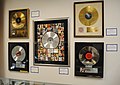 Image 19Platinum records by Elvis Presley, Prince, Madonna, Lynyrd Skynyrd, and Bruce Springsteen, at Julien's Auctions (from Album era)