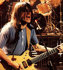 Malcolm Young performing in 1990 during the Razors Edge World Tour.