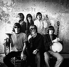 Jefferson Airplane photographed by Herb Greene in his dining room, San Francisco, late 1966; top row from left: Jack Casady, Grace Slick, Marty Balin; bottom row from left: Jorma Kaukonen, Paul Kantner, Spencer Dryden