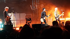 (L–R): Touring member Jason White, Billie Joe Armstrong, and Mike Dirnt performing in August 2021