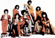 The "classic" line-up in 1971. Left to right: Neal Schon, Gregg Rolie, Michael Shrieve, Michael Carabello, David Brown, Carlos Santana, José "Chepito" Areas.