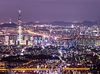 Illuminated nighttime urban landscape of Seoul