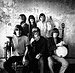Jefferson Airplane photographed by Herb Greene at The Matrix club, San Francisco, in 1966. Top row from left: Jack Casady Grace Slick, Marty Balin; bottom row from left: Jorma Kaukonen, Paul Kantner, Spencer Dryden. A cropped version was used for the front cover of Surrealistic Pillow.