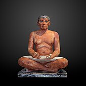 The Seated Scribe; 2613–2494BC; painted limestone and inlaid quartz; height: 53.7cm