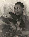 Image 2 Bessie Smith Photograph credit: Carl Van Vechten; restored by Adam Cuerden Bessie Smith (April 15, 1894 – September 26, 1937) was an American blues singer widely renowned during the Jazz Age. She is often regarded as one of the greatest singers of her era and was a major influence on fellow blues singers, as well as jazz vocalists. Born in Chattanooga, Tennessee, her parents died when Smith was young, and she and her sister survived by performing on the streets of Chattanooga, Tennessee. She began touring and performed in a group that included Ma Rainey, and then went out on her own. Her successful recording career began in the 1920s, until an automobile accident ended her life at age 43. More selected pictures