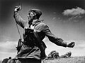 Image 11 Kombat Photograph credit: Max Alpert Kombat (Russian for 'battalion commander') is a black-and-white photograph by Soviet photographer Max Alpert. It depicts a Soviet military officer, armed with a TT pistol, raising his unit for an attack during World War II. This work is regarded as one of the most iconic Soviet World War II photographs, yet neither the date nor the subject is known with certainty. According to the most widely accepted version, it depicts junior politruk Aleksei Gordeyevich Yeryomenko, minutes before his death on 12 July 1942, in Voroshilovgrad Oblast, now part of Ukraine. The photograph is in the archives of RIA Novosti, a Russian state-owned news agency. More selected pictures
