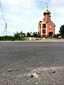 Church of Holy Epiphany in Karlivka, Donestk Oblast, on 23 May 2014, shells on road from fighting between Ukrainian forces and pro-Russian separatists.