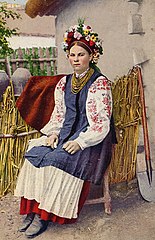 A postcard printed in 1916 featuring a Ukrainian peasant lady in vyshyvanka and traditional wreath.