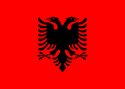 Red flag with a black double-headed eagle in the centre.
